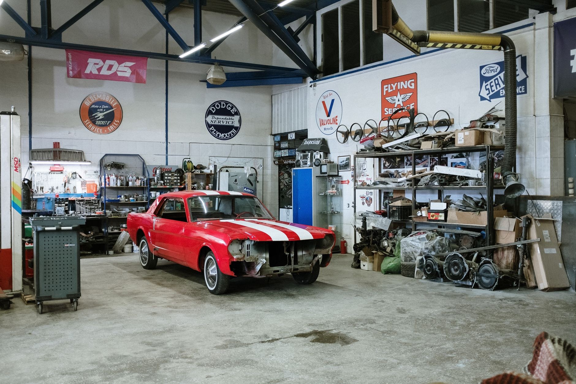 A car being worked on in the workshop